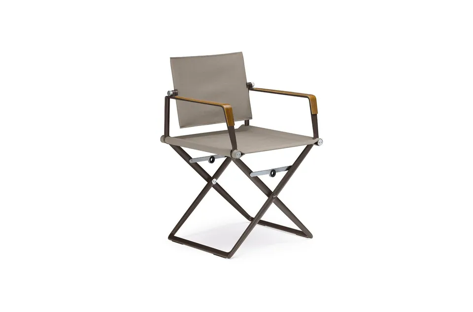 Dedon Seax armchair armrest with sea-bent plywood finish - black pepper frame, studio photo