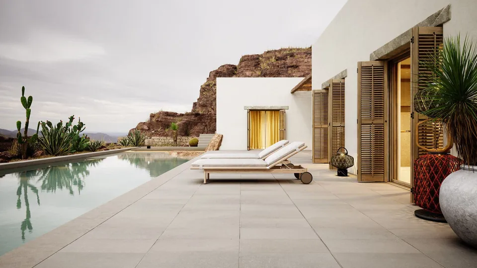Dedon Tibbo teak armchair and dining table, an outdoor dining set on a terrace